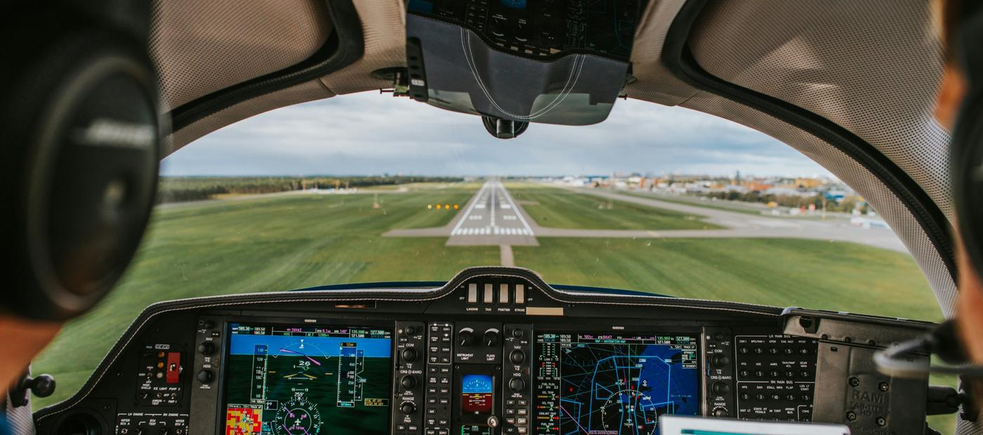 View from a small plane cockpit lined up with a runway