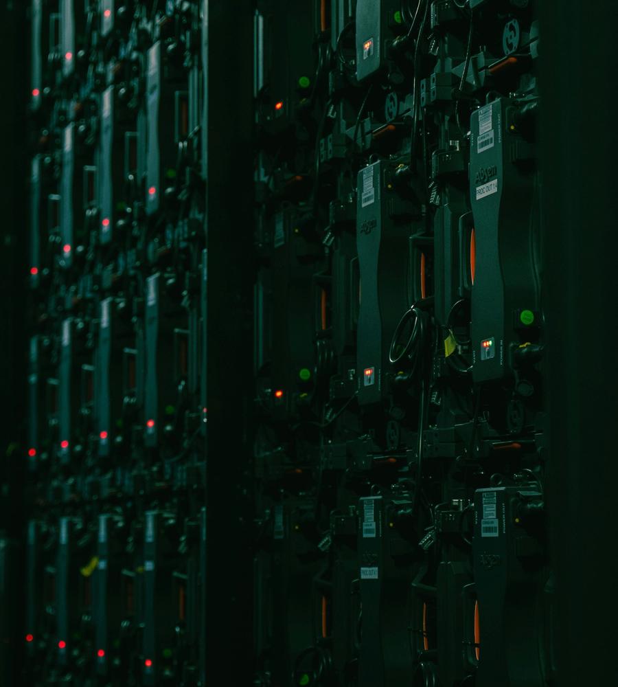 Server racks with small red and green status lights